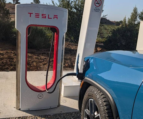 Can Your Rivian Use a Tesla Supercharger? Here's What You Need to Know
