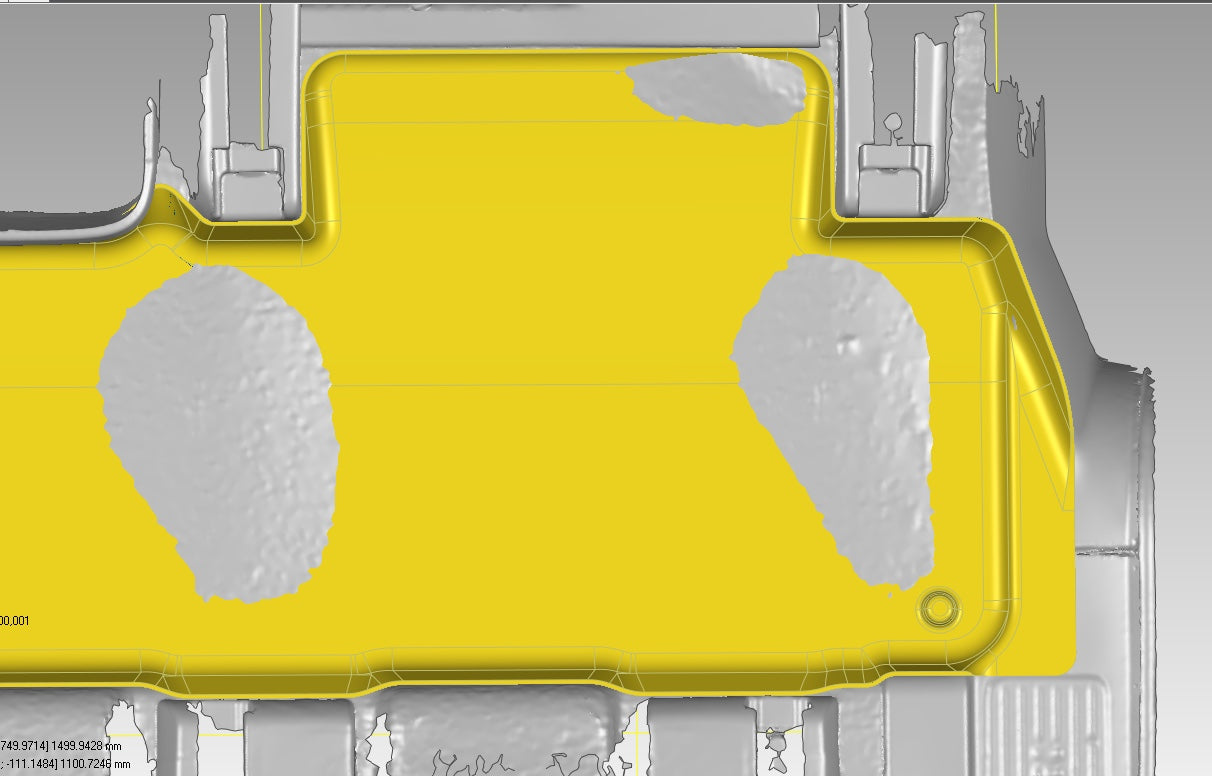 A digital 3D model of a Rivian R1S features a yellow area with gray highlights suggesting wear, amid mechanical parts made of durable thermoplastic elastomer, likely showcasing LinerX Floor Mats for the 2022-2024 Rivian R1S.
