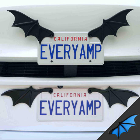 A SnapPlates license plate from EveryAmp with EVERYAMP is adorned with License Plate Bat Wings, made of recycled PETG plastic, and mounted on the front of a white car.