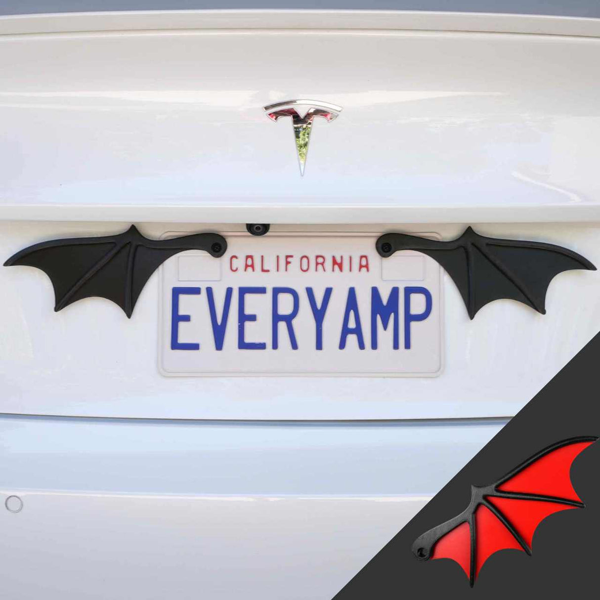 A white Tesla features a California license plate reading EVERYAMP, accented by EveryAmps License Plate Bat Wings in red, crafted from recycled PETG plastic. A close-up inset highlights this eco-friendly accessory, adding whimsy to the SnapPlates setup.