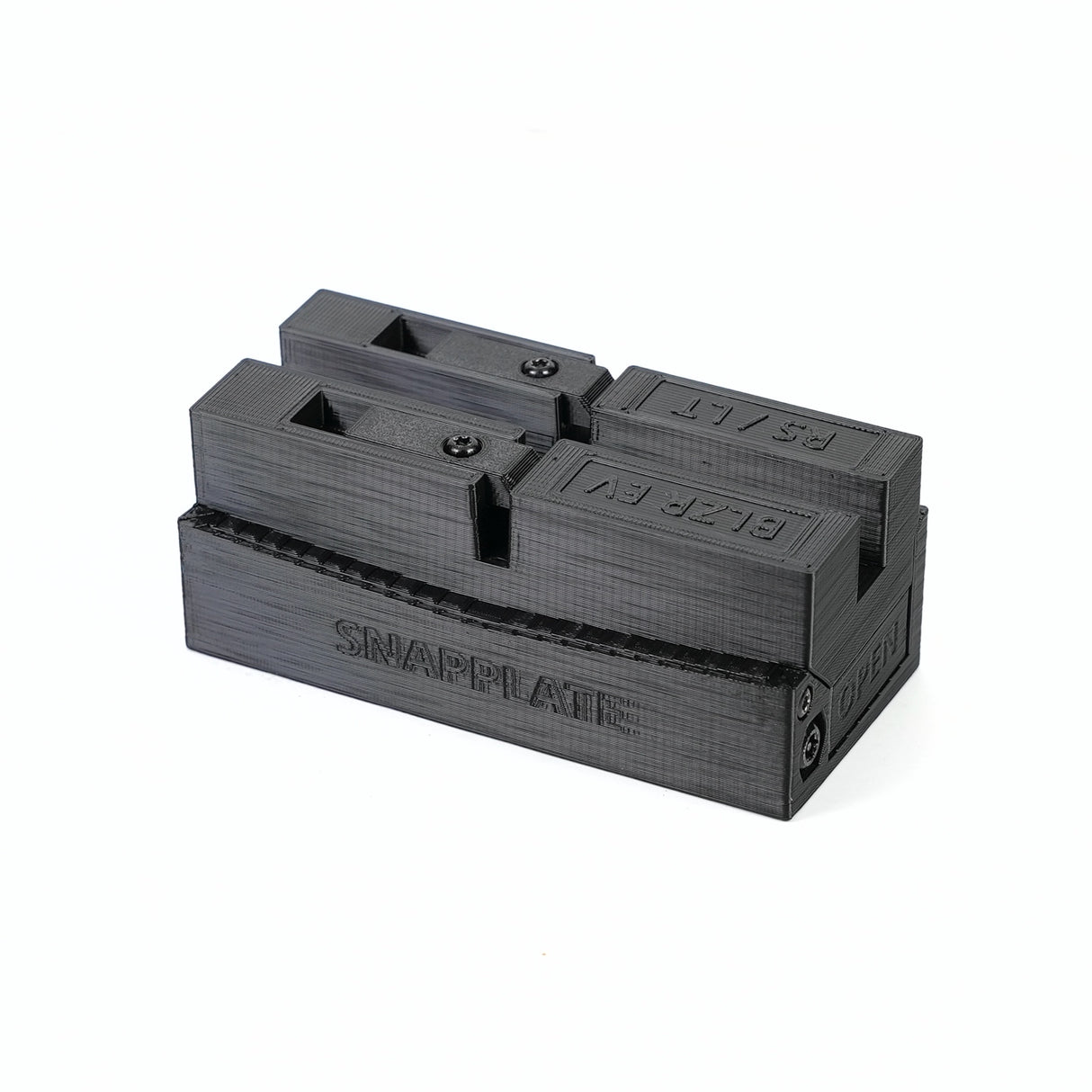 A black plastic SnapPlate Base by EveryAmp, 3D-printed for the Chevrolet Blazer EV (2024+), features SNAPPLATE and directional arrows embossed on its surface.