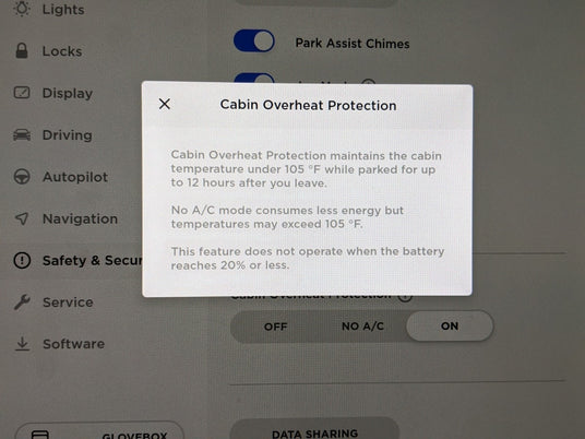 Car dashboard screen showing a notification about Cabin Overheat Protection, detailing its functions, limitations, and conditions related to temperature and battery level.