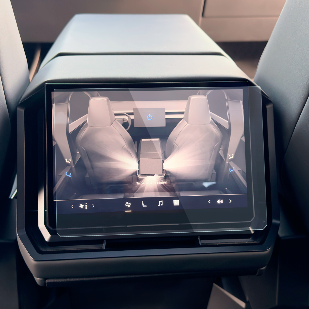 The Abstract Ocean Ultra-Premium Tempered Glass screen protectors for the Cybertruck display a rear-seat view with two empty seats, an armrest, and vehicle controls below.