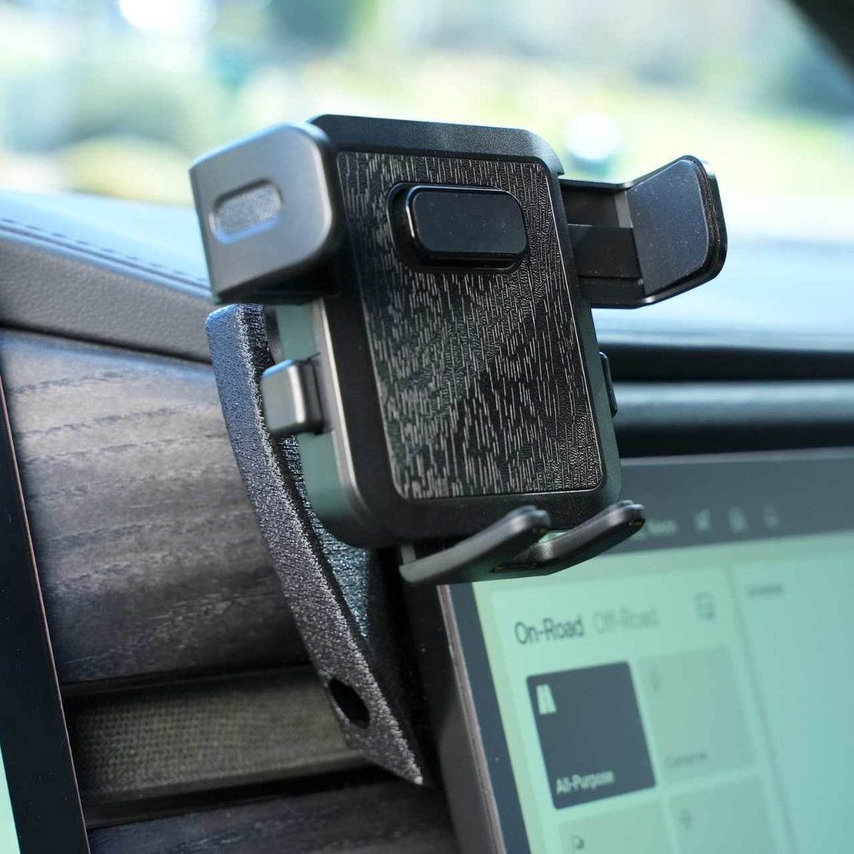 EveryAmp universal phone mount clamp installed in a Rivian R1T