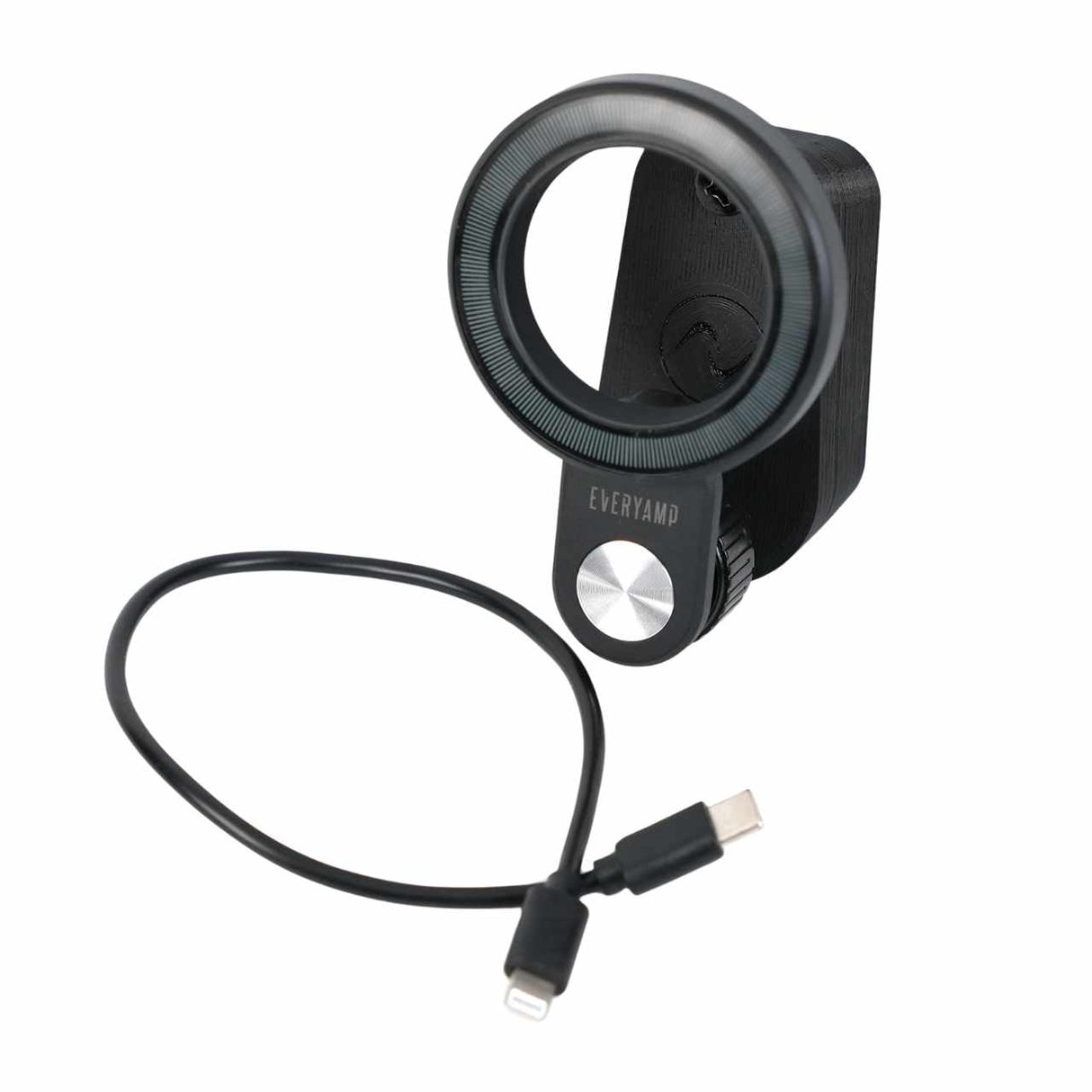 The EveryAmp Back Seat Tablet/Phone Mount Anchor for Rivian R1T and R1S, a black circular device shown with a USB-C to Lightning cable, is the perfect versatile accessory for Rivian seat back mounting needs.