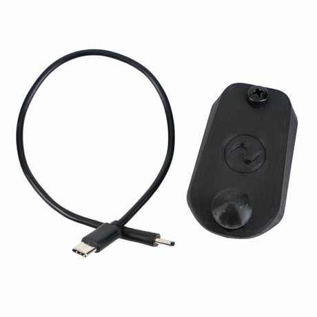 The EveryAmp Back Seat Tablet/Phone Mount Anchor for Rivian R1T and R1S is a black 3D-printed mount with a button and screw, shown with a USB-C charging cable—perfect for rear seat mounting setups and accessories.