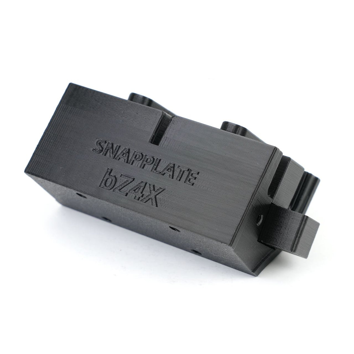 The EveryAmp SnapPlate Base for Toyota bZ4X (2023-2025) is a black rectangular plastic replacement part with side mounting elements, labeled specifically for the vehicle.
