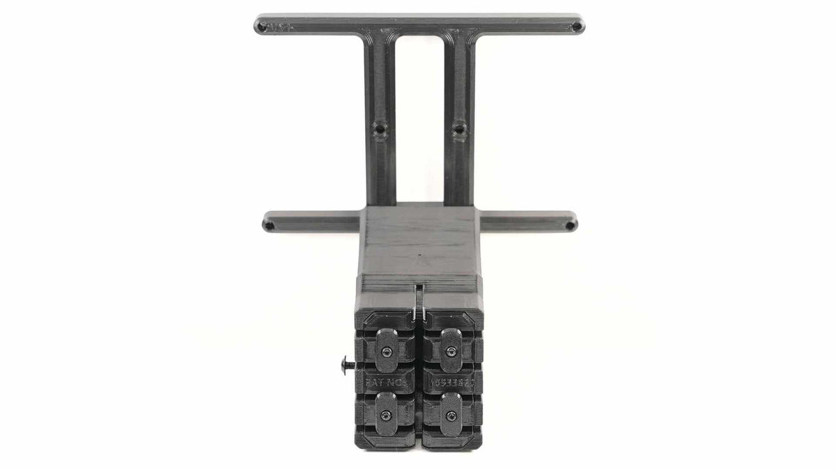 A metal industrial tool with a flat top handle and a multi-pronged base, featuring numerical markings on the prongs.