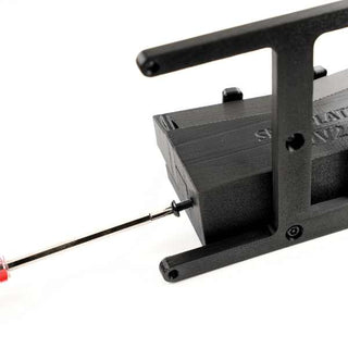 A black 3D-printed component with a metal rod inserted into a threaded hole, partially visible red tool on the left.