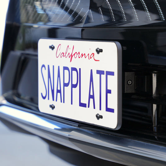 SnapPlate front license plate mount for Cadillac electric vehicle.