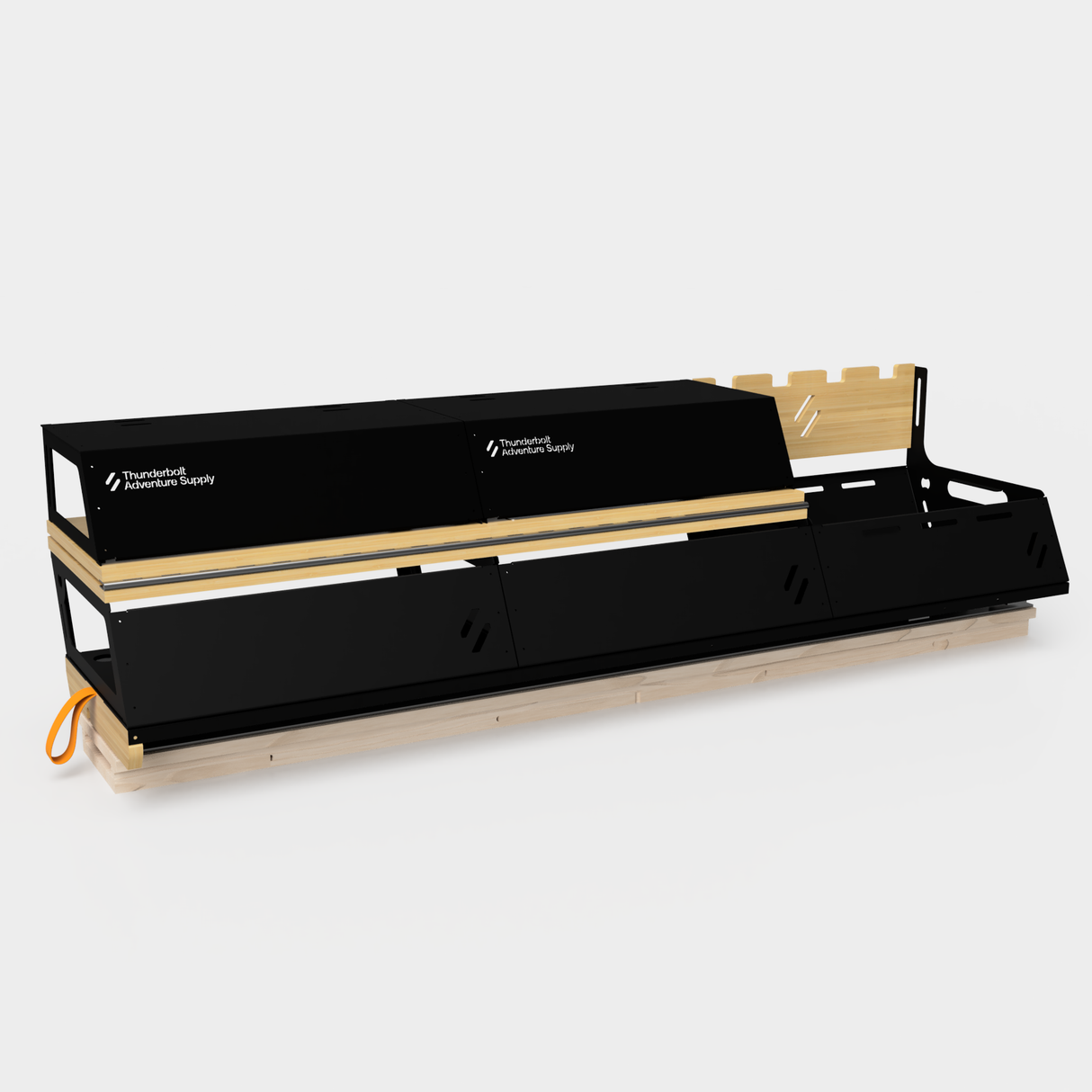 The Thunderbolt Adventure Supply Rivian R1T - Overland Kitchen with updated Gear Sled is a black and wood modular storage unit with labeled compartments and open shelves, perfect for organizing gear or pairing with an R1T Overland Kitchen setup.
