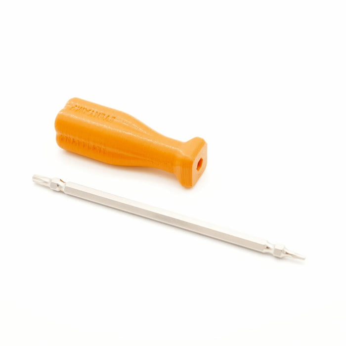 Orange screwdriver handle and a double-ended metal screwdriver bit placed on a white background.