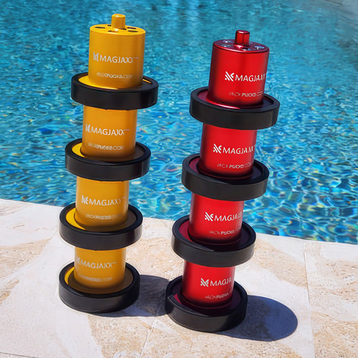 Two stacks of red and yellow Magjooj cups are placed by the edge of a swimming pool on a sunny day. Each stack has five cups with black rings between them.