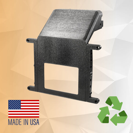 Black 3D-printed bracket with a rectangular cutout, set against a geometric background. Features Made in USA text with a flag and recycling symbol.