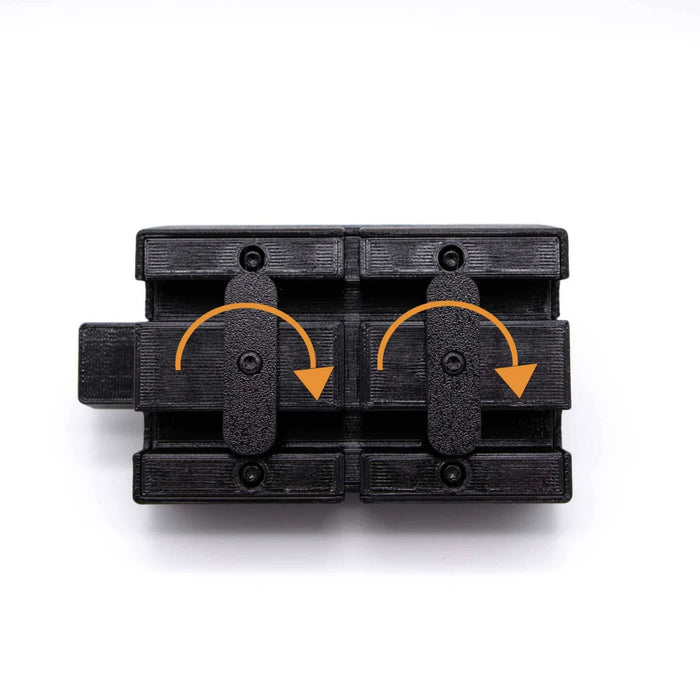 A black mechanical hinge with two moveable parts and orange arrows indicating the direction of movement, set against a light gray background.