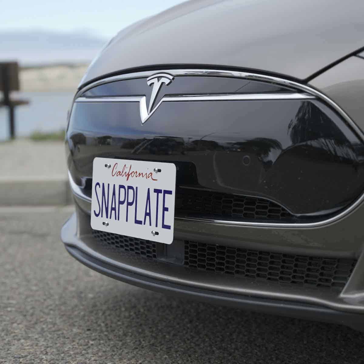 Close view of SnapPlate Front License Plate Holder for 2012 to 2016 Tesla Model S showing grille position