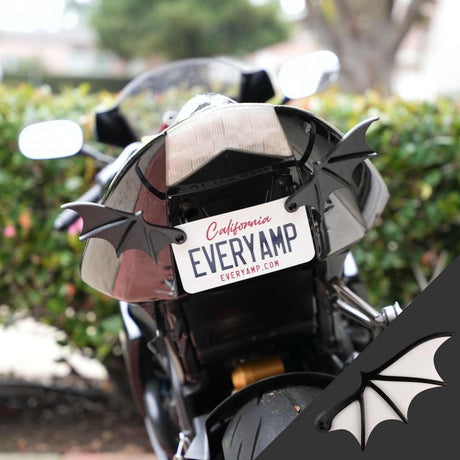 A motorcycle with a California plate EVERYAMP features EveryAmps License Plate Bat Wings, made from recycled PETG plastic, attached near the tail light.