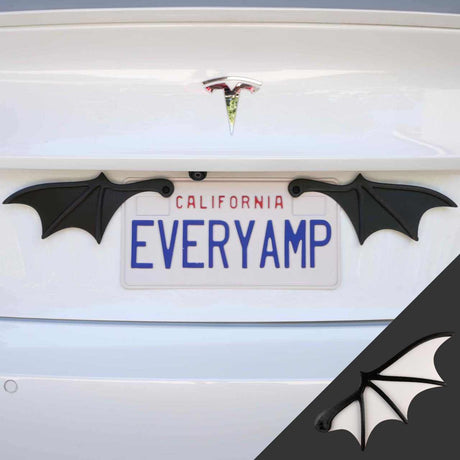 A car with a California license plate, reading EVERYAMP, features EveryAmps License Plate Bat Wings in white, crafted from recycled PETG plastic and mounted with SnapPlates.