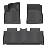 Set of three black molded LinerX Floor Mats for Rivian R2 (2027) with ribbed patterns and mounting grommets.