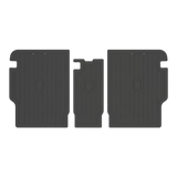 Three black rubber LinerX Seat Back Cover Mats for Rivian R2 providing cargo protection for the back of the vehicle seats.