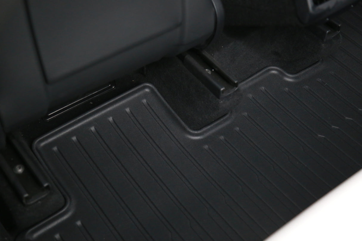 Close-up of LinerX Floor Mats for 2026 Tesla Model Y (Juniper) installed in the rear seats, providing durable, eco-friendly protection and easy cleaning.