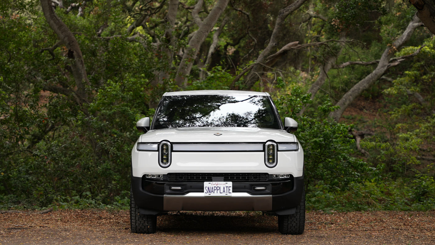 Rivian R1T shown with a SnapPlate front license plate holder installed