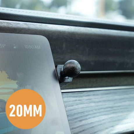 A close-up shows an EveryAmp Phone Mount Dash Anchor for Rivian R1T and R1S, featuring a black knob holding a screen with colorful graphics on a textured dashboard. An orange 20MM circle hints at the sophisticated design of vehicles like the R1T and R1S.