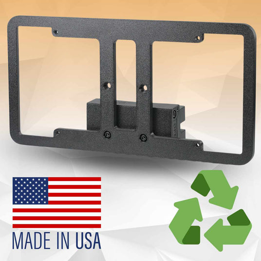 A metal mounting bracket with a textured finish is displayed next to a Made in USA label and a recycling symbol on a geometric background.
