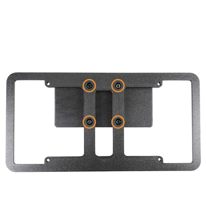 A black metal license plate bracket with four attached bolts, set against a white background.