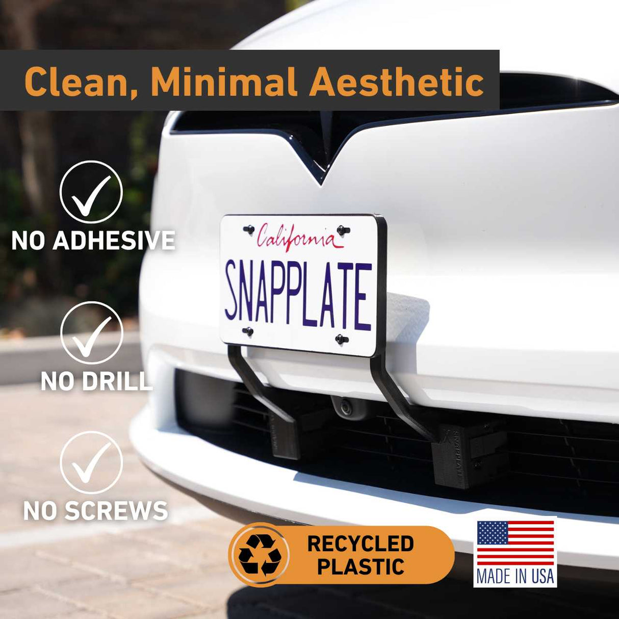 The EveryAmp Tesla Model X SnapPlate Front License Plate Holder mounts to a white Tesla without adhesive, drilling, or screws. Made in the USA from 3D-printed, recycled PETG with an eco-friendly recycled plastic design.