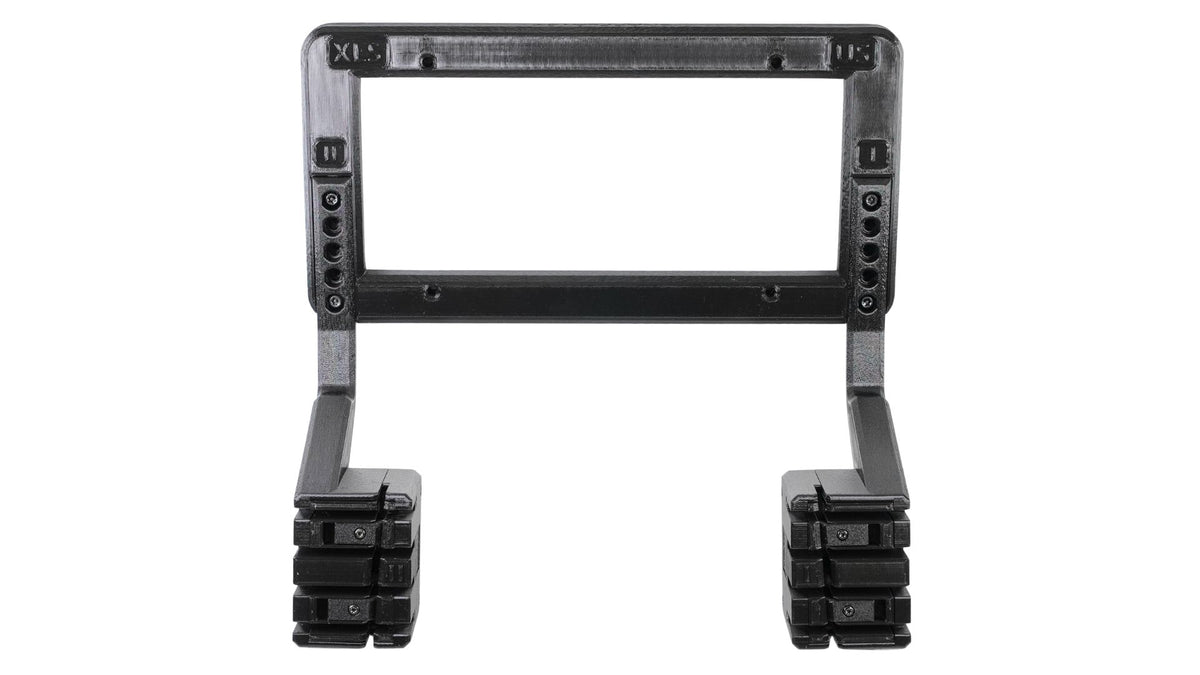 A black plastic frame with adjustable arms and grooved, rectangular bases, possibly a holder or mounting bracket for equipment.