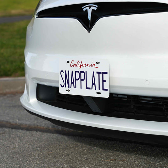 SnapPlate removable license plate holder installed on a Tesla vehicle