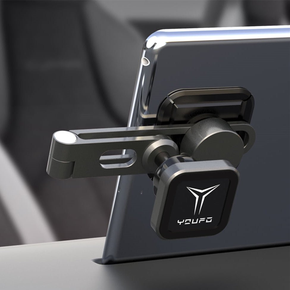 A Center Screen Magnetic Phone Holder for Model 3/Y/S/X/Cybertruck from Tesery Official Store is attached to a smartphone, securing it firmly to any flat surface.