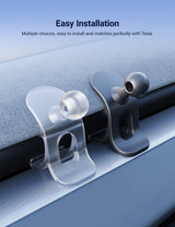 Two transparent plastic clips attach to your car for easy installation. Designed for Tesla Model 3 Highland & Model Y Juniper, the Flexible Phone Holder from Tesery Official Store ensures a secure fit.