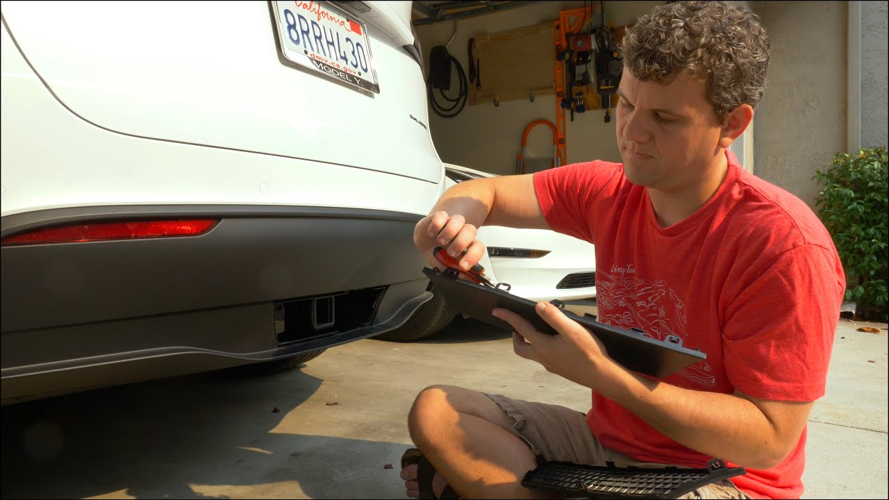 Instructions on how to make the Tesla Model Y hitch cover easier to remove.