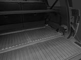 Open the trunk of a Rivian R1S to reveal the LinerX Cargo Liner (2022-2026 model), a ribbed rubber mat offering all-weather cargo area protection with rear seats upright—ideal for those wanting premium Rivian R1S accessories.