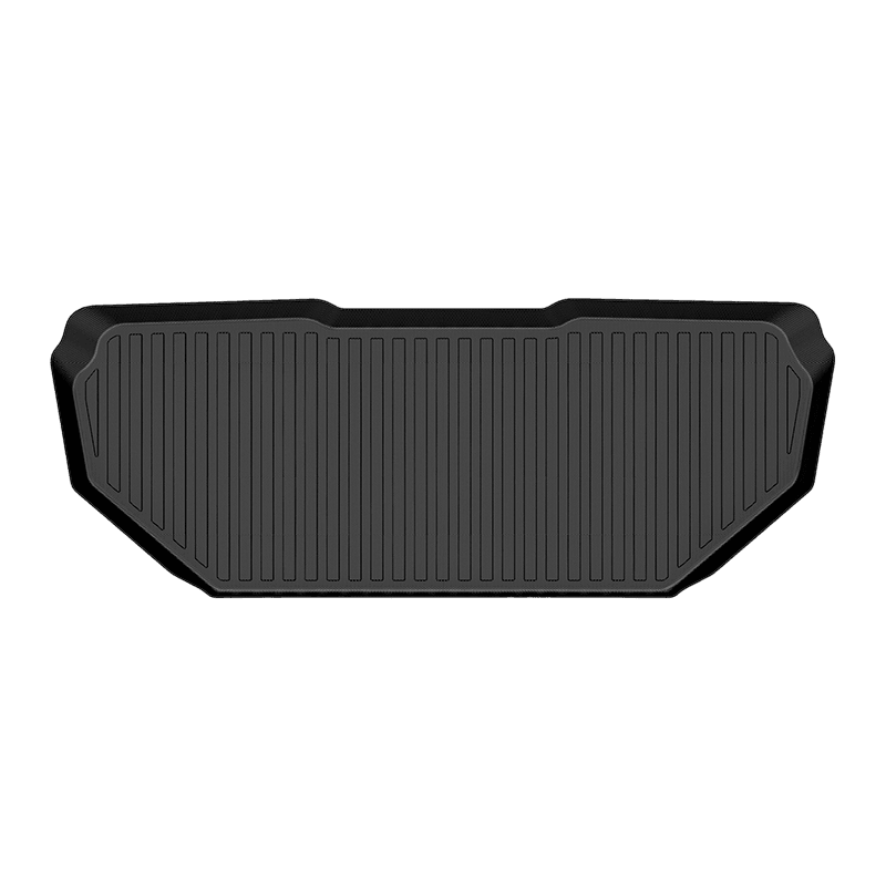 The black LinerX Front Cargo Liner for 2022-2024 Rivian R1S/R1T features raised edges and vertical grooves for enhanced protection, displayed on a plain white background.