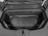 Open the Rivian R1S/R1T front trunk to reveal a spacious, black plastic-lined compartment protected by the LinerX Front Cargo Liner for easy cleaning. Suitable for 2022-2024 models. Brand: LinerX.