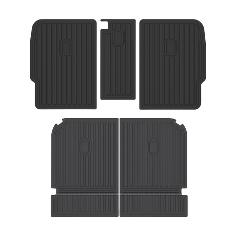 Four black, rectangular LinerX Seat Back Cover Mats for 2022-2026 Rivian R1S, featuring ribbed surfaces and made of thermoplastic, are arranged in two rows on a plain background.