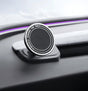 The Tesery Official Store Magnetic Dashboard Phone Mount for Model 3 Highland/Model Y Juniper is attached to a dashboard with a purple ambient light strip, making it an ideal Tesla Model 3 phone holder.