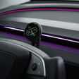 A close-up of the Tesery MagLink HUD—an OLED Magnetic Dashboard Display for Model Y Juniper/Model 3 Highland by Tesery Official Store—showing vehicle stats with a circular screen and purple LED strip, seen as if through a responsive iframe.