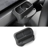 The Tesery Official Store Sunglasses & Phone Holder Organizer for Model Y Juniper is a black plastic car accessory with two compartments, ideal for Tesla interior upgrades, shown mounted on a dashboard and on a white background.
