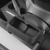 A close-up of the Tesery Official Store Sunglasses & Phone Holder Organizer for Model Y Juniper highlights its rectangular shape, textured interior, and convenient integration into your vehicle’s dashboard.