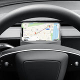 A Sunglasses & Phone Holder Organizer for Model Y Juniper from Tesery Official Store securely holds a phone behind the steering wheel, displaying navigation to London—all styled in a neat Tesery product container with scoped CSS rules.