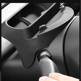 A close-up shows the Sunglasses & Phone Holder Organizer for Model Y Juniper from Tesery Official Store mounted above the steering wheel, with a hand holding a car key below—perfect for your product description or container.