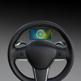 A smartphone is mounted on the Tesery Official Store Magsafe Wireless Charging Phone Holder for Model Y/3 Highland, securely attached to the top center of a Tesla Model Y & 3 steering wheel.